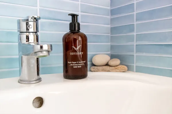 Sink with luxury handwash next to the tap